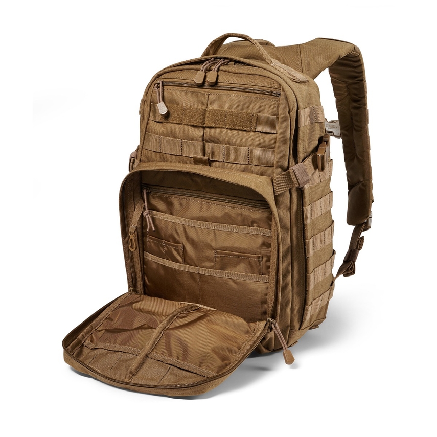 A backpack with many compartments and an open compartment.