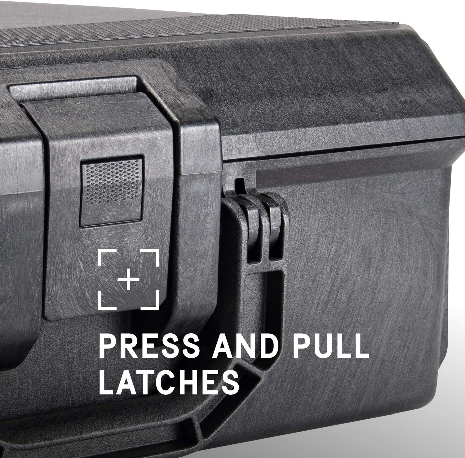 A close up of the press and pull latches on a tool box.